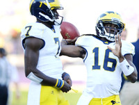 Devin Gardner (7) and Denard Robinson (16)