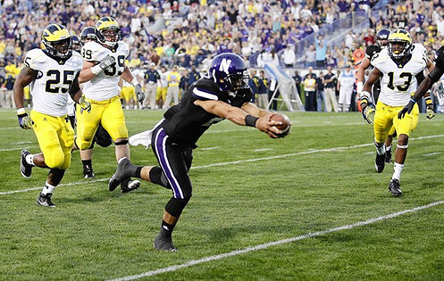 Kenny Demens (25), Will Heininger (39), and Carvin Johnson (13)