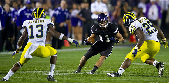 Carvin Johnson (13) and Kenny Demens (25)