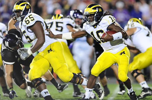 Patrick Omameh (65), Michael Schofield (75), Denard Robinson (16), and Mark Huyge (72)