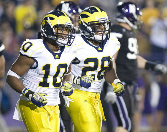 Jeremy Gallon (10) and Fitzgerald Toussaint (28)