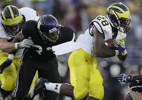 Michael Schofield (75) and  Fitzgerald Toussaint (28)
