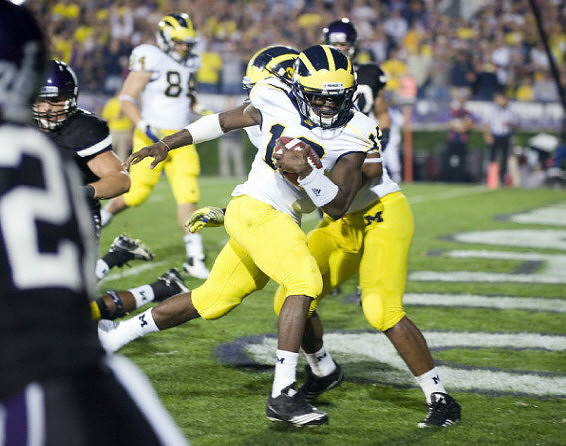 Steve Watson (84) and Denard Robinson (16)