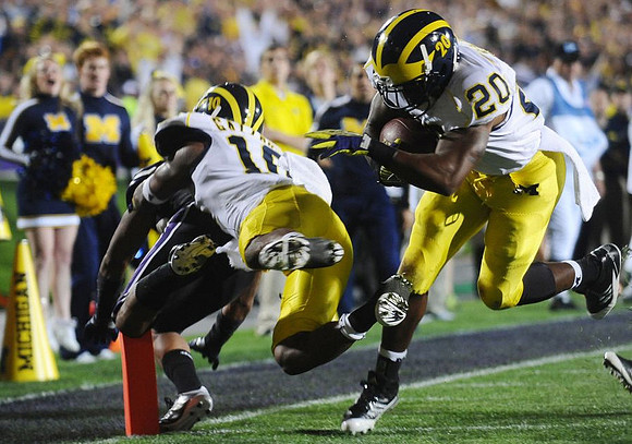 Jeremy Gallon (10) and Michael Shaw (20)