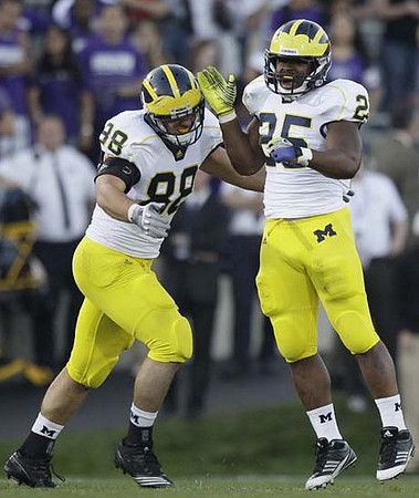Craig Roh (88) and Kenny Demens (25)