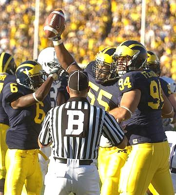 Donovan Warren, Brandon Graham, and John Ferrara