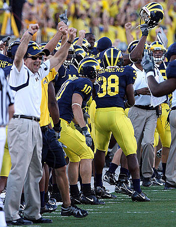 Lloyd Carr, Steven Threet, and Artis Chambers