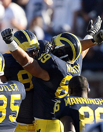 Carson Butler, Will Johnson, Tim North, and Mario Manningham