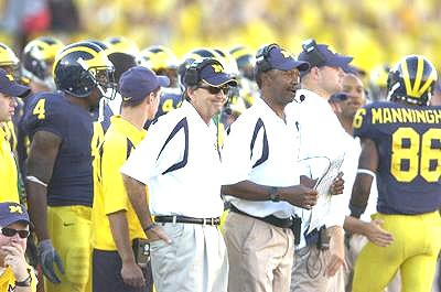 Brandon Minor, Lloyd Carr, Fred Jackson, Chad Henne, and Mario Manningham