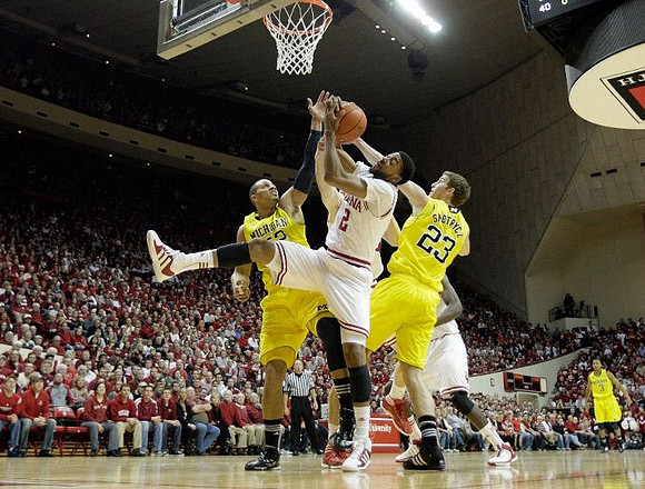 Jordan Morgan (52), Evan Smotrycz (23), and Trey Burke (3)