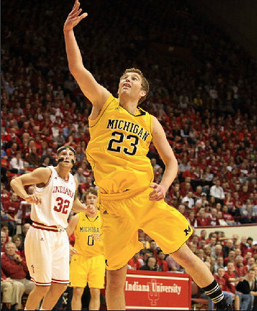 Evan Smotrycz (23) and Zack Novak (0)