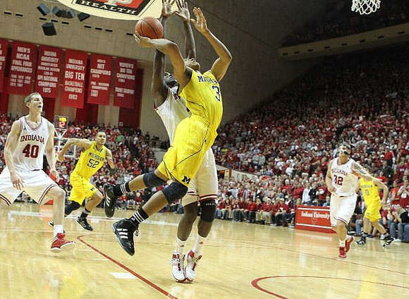 Jordan Morgan (52), Trey Burke (3), and Zack Novak (0)