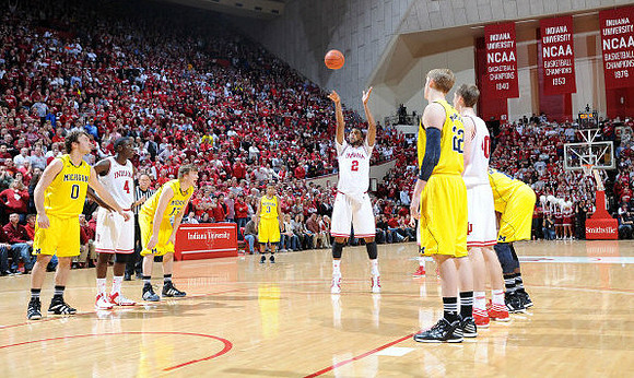 Zack Novak (0), Matt Vogrich (13), Trey Burke (3), Blake McLimans (22), and Tim Hardaway Jr. (10)
