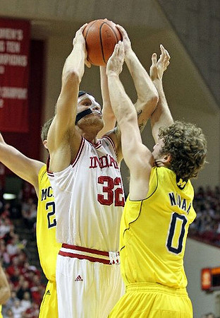 Evan Smotrycz (23) and Zack Novak (0)