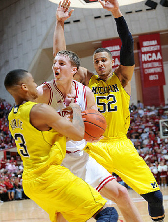 Trey Burke (3) and Jordan Morgan (52)