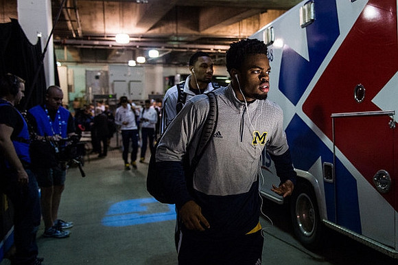 Derrick Walton Jr. (10) and Zak Irvin (21)