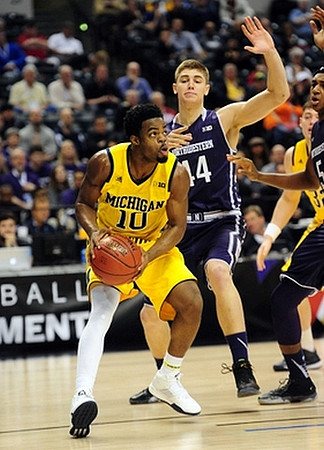 Derrick Walton Jr. (10) and Ricky Doyle (32)
