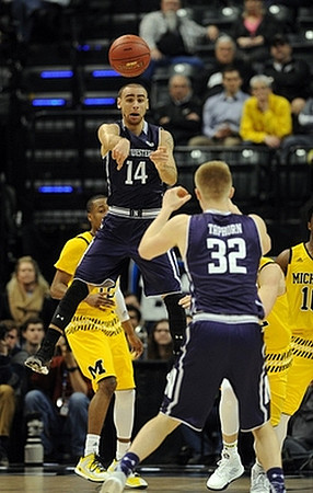 Muhammad-Ali Abdur-Rahkman (12) and Derrick Walton Jr. (10)