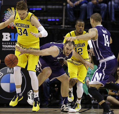 Mark Donnal (34) and Muhammad-Ali Abdur-Rahkman (12)