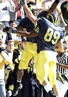 Braylon Edwards (1) and Tyler Ecker (89)