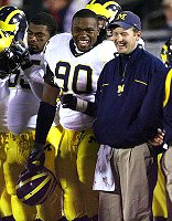 Tim Jamison, Scot Loeffler, and Brandon Graham