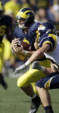 Sam McGuffie (2) and Nick Sheridan (8)