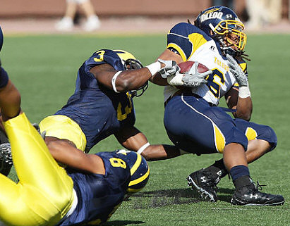 Stevie Brown (3) and Jonas Mouton (8)