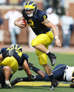 Sam McGuffie (2) and Mark Moundros (44)