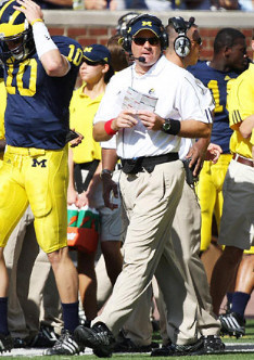 Steven Threet (10) and Rich Rodriguez