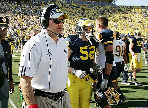 Rich Rodriguez and Kevin Leach (52)