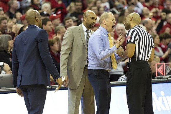 Deandre Haynes, Saddi Washington, and John Beilein