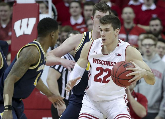 Charles Matthews (1) and Jon Teske (15)