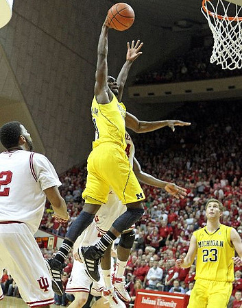 Tim Hardaway Jr. (10) and Evan Smotrycz (23)