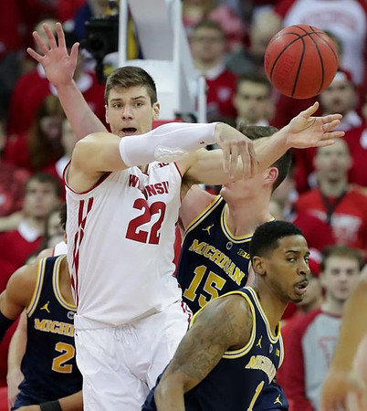 Jordan Poole (2), Jon Teske (15), and Charles Matthews (1)