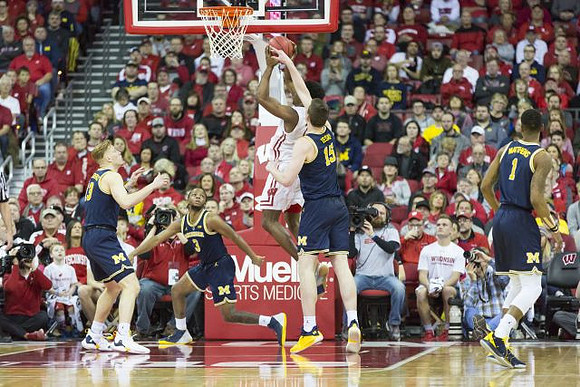 Ignas Brazdeikis (13), Zavier Simpson (3), Jon Teske (15), and Charles Matthews (1)