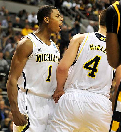 Glenn Robinson III (1) and Mitch McGary (4)