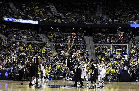 Mitch McGary (4), Trey Burke (3), Tim Hardaway Jr. (10), and Nik Stauskas (11)