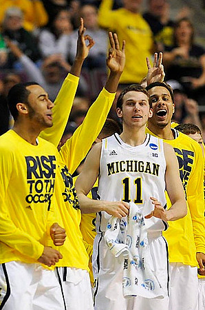 Jon Horford (15), Nik Stauskas (11), and Jordan Morgan (52)