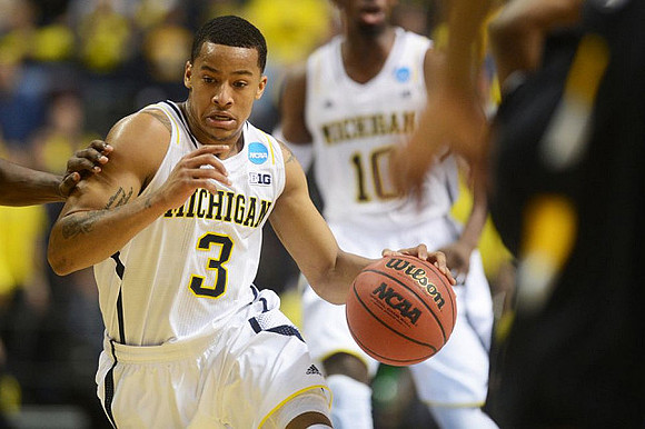 Trey Burke (3) and Tim Hardaway Jr. (10)