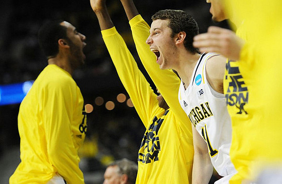 Jordan Morgan (52) and Nik Stauskas (11)