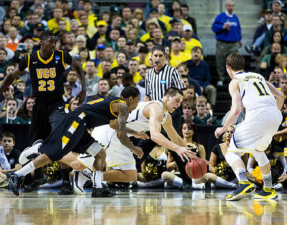 Mitch McGary (4) and Nik Stauskas (11)