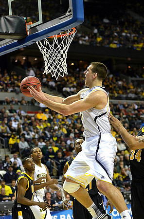 Mitch McGary (4) and Glenn Robinson III (1)