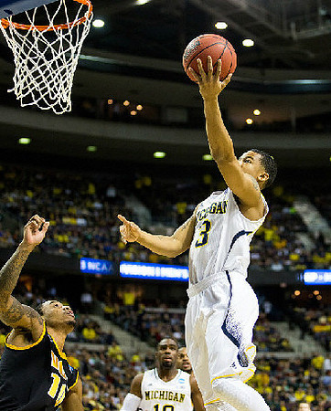 Trey Burke (3) and Tim Hardaway Jr. (10)