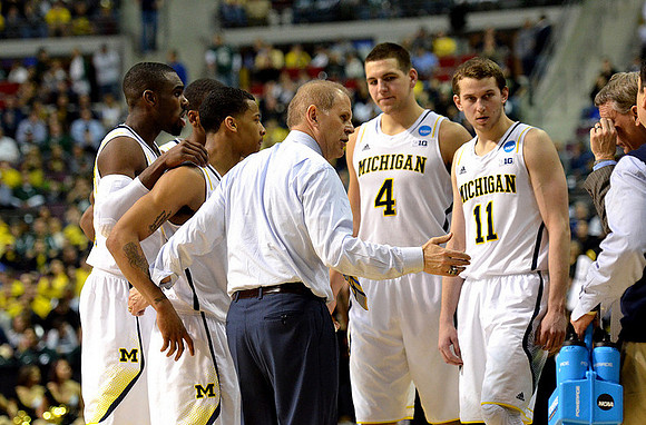 Tim Hardaway Jr. (10), Trey Burke (3), John Beilein, Mitch McGary (4), Nik Stauskas (11), and Jeff Meyer