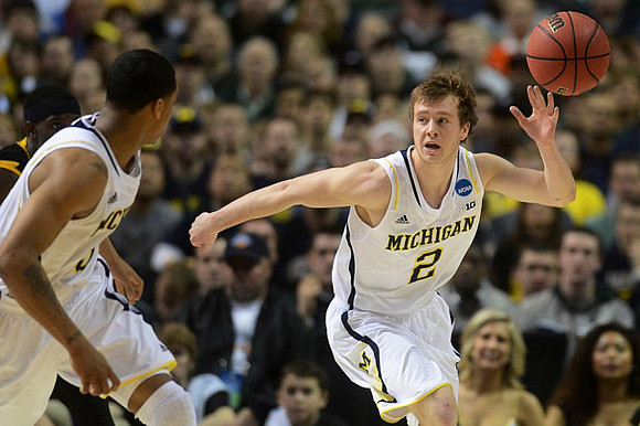 Trey Burke (3) and Spike Albrecht (2)
