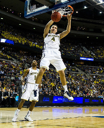 Mitch McGary (4) and Glenn Robinson III (1)