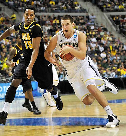Mitch McGary (4) and Tim Hardaway Jr. (10)