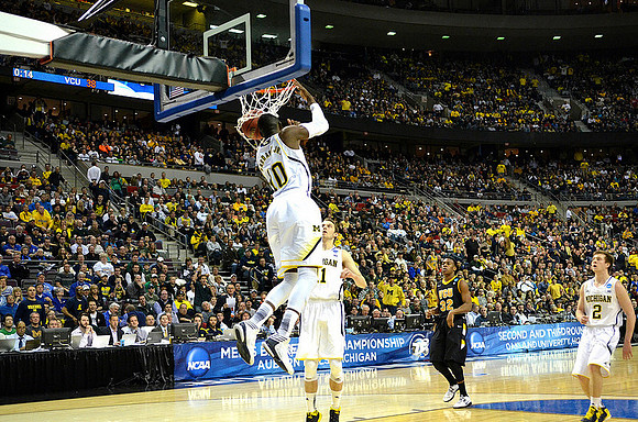 Tim Hardaway Jr. (10), Nik Stauskas (11), and Spike Albrecht (2)