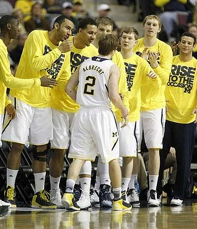 Caris LeVert (23), Jon Horford (15), Spike Albrecht (2), Jordan Morgan (52), Max Bielfeldt (44), Matt Vogrich (13), Blake McLimans (22), and Josh Bartelstein (20)
