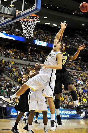 Mitch McGary (4) and Glenn Robinson III (1)